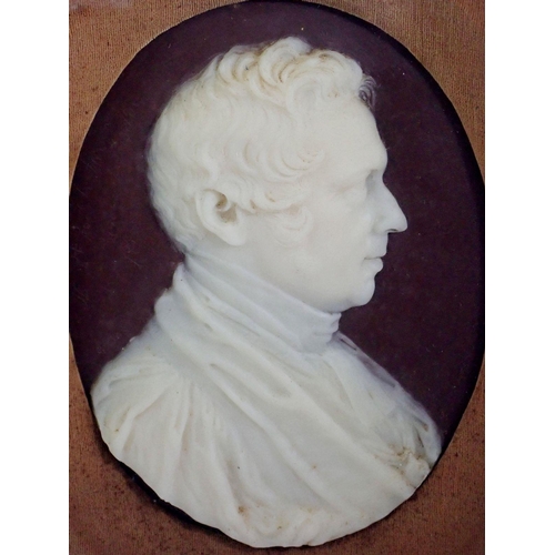 1361 - A 19th century wax portrait bust of the Rev Sumner in carved frame, 37 x 33cm overall