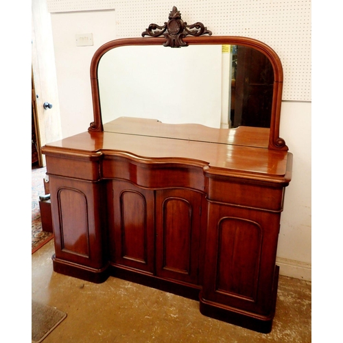 1375 - A Victorian mahogany serpentine fronted mirror back sideboard with scroll carved surmount, 150cm wid... 