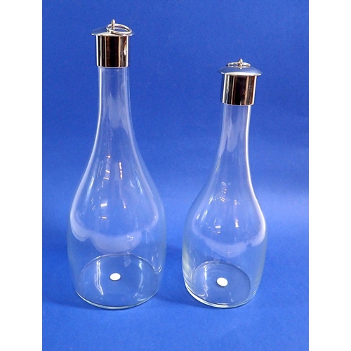 144 - Two glass wine decanters with chrome stoppers, largest 31cm