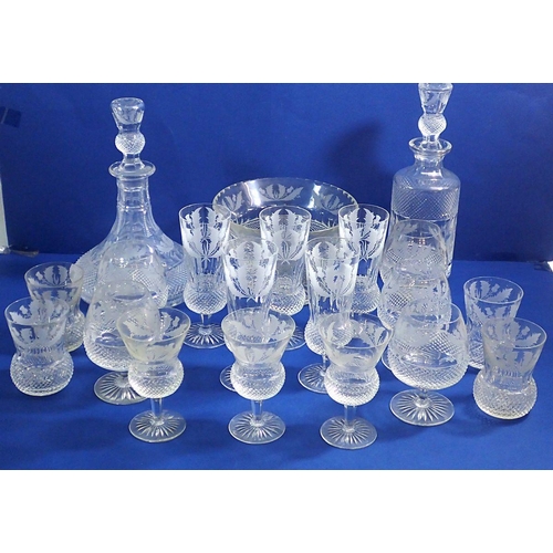 151 - An Edinburgh Crystal Thistle part suite of drinking glasses comprising two decanters, five brandy gl... 