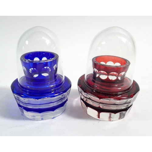 174 - A pair of red and blue overlaid and cut glass tooth pick holders and covers, 7cm