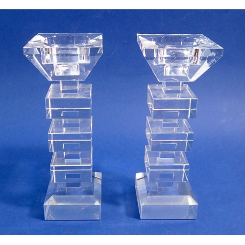 177 - A pair of stepped cut glass candlesticks, 17cm