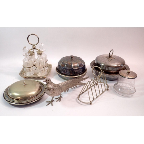 192 - A group of silver plated items including cruet stand, toast rack etc.