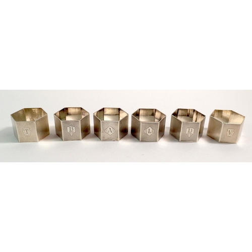 199 - A set of six silver hexagonal napkin rings each engraved initial by Turner and Simpson, Birmingham 1... 