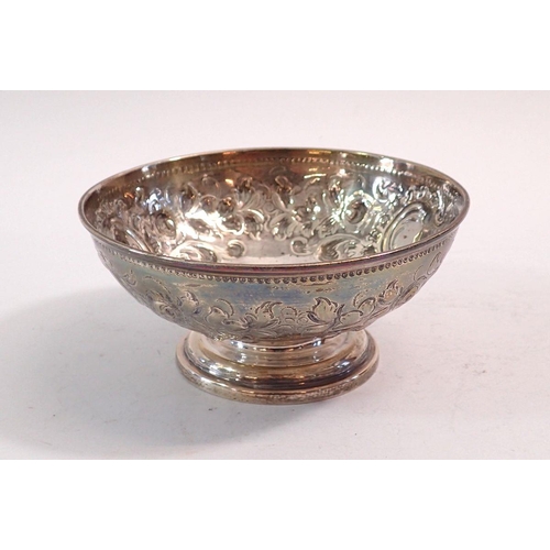 210 - A Victorian silver bowl embossed flowers and scrollwork, 11.5cm diameter, 114g, Sheffield 1856, by M... 