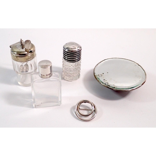 220 - Two silver topped toiletry bottles, silver mirror, silver brooch etc.