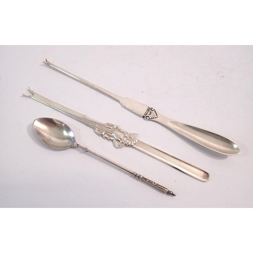 228 - A Norwegian 830 silver lobster pick marked Thune, a Norwegian 800 standard spoon and a Danish silver... 