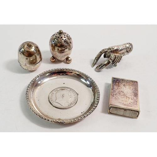 236 - A silver mounted rupee dish 1904 8cm diameter, two silver egg form cruets, a silver plated vesta and... 