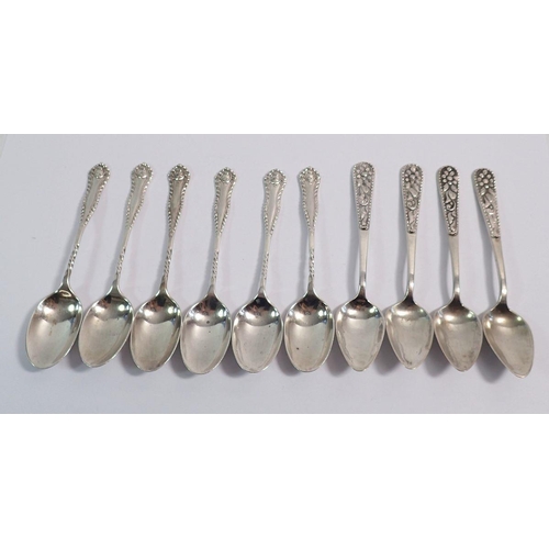 237 - A set of six silver coffee spoons with spiral and gadrooned decoration, Sheffield 1912, 80g and four... 