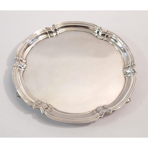 251 - A small silver salver on three hoof feet, 25.5cm diameter, Sheffield 1966 by WEV, 375g