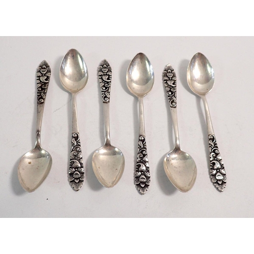 252 - A set of six 800 standard silver coffee spoons with stylised floral handles, marked RM, 76g