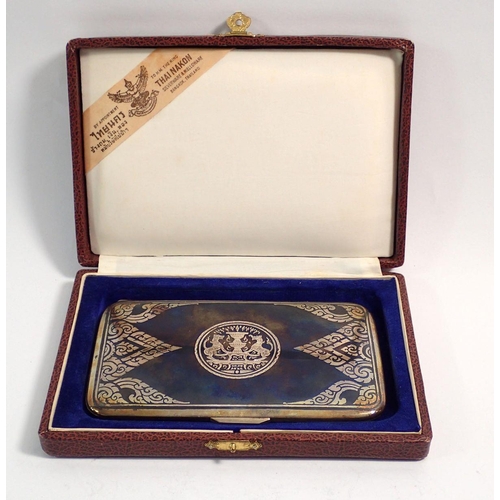 257 - A silver niello cigarette box decorated crest and with inscription to reverse, boxed, 14 x 8.5cm, 20... 