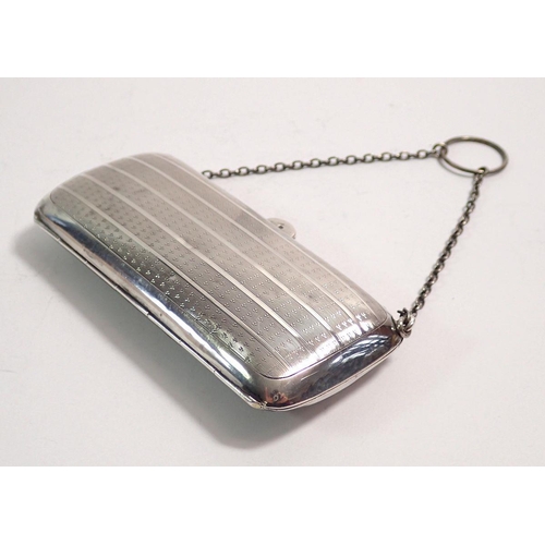 279 - A silver purse with leather interior by D.Bros Birmingham 1915, 87g