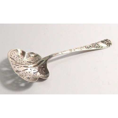 282 - A late Victorian silver sifter spoon with pierced and engraved bowl, Birmingham 1898, 12cm long, 15g