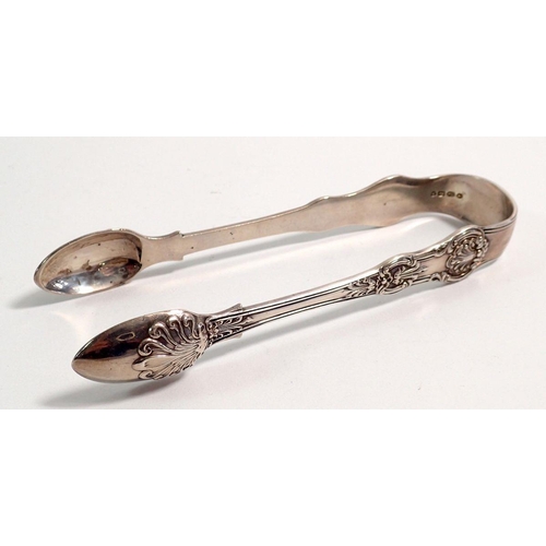 284 - A pair of Victorian silver sugar tongs, London 1856, by Henry Holland, 77.5g