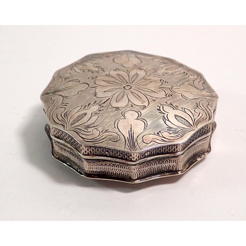 291 - A 19th century Dutch silver twelve sided snuff box with engraved and punched decoration, 5.5cm diame... 