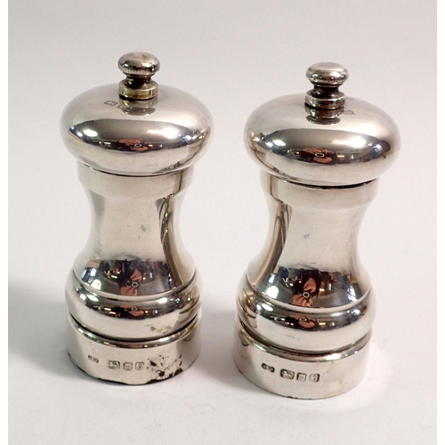 299 - A pair of silver salt and pepper grinders, London 1992 John Bull