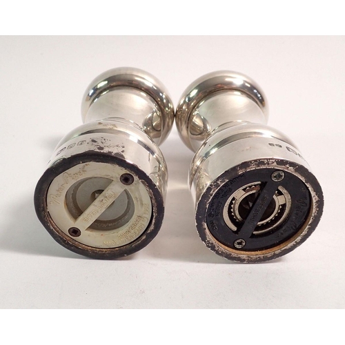 299 - A pair of silver salt and pepper grinders, London 1992 John Bull