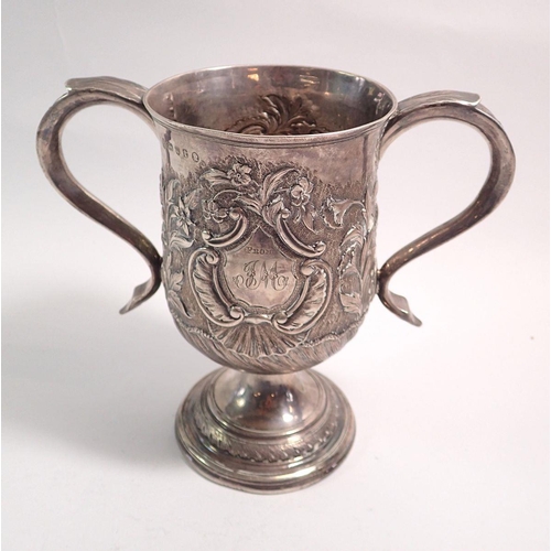 302 - A George III silver two handled loving cup with embossed shell and flower decoration by Peter & Ann ... 