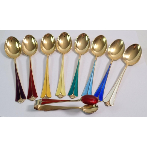 304 - A collection of eight Norwegian David Andersen harlequin silver gilt and enamel teaspoons and a pair... 