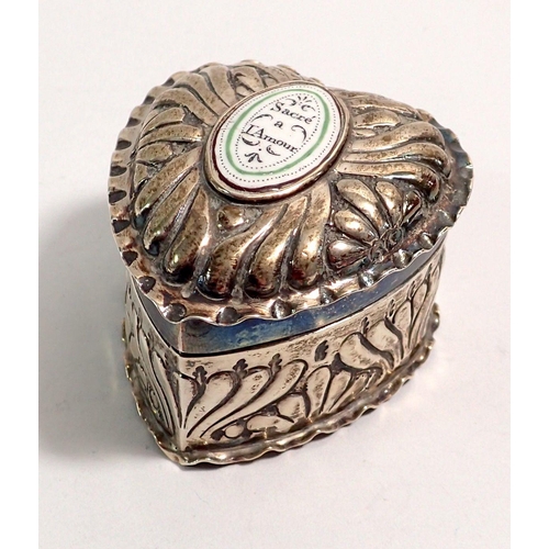 307 - A Victorian silver heart form trinket box with enamel insert to lid 'Sacre a L'Amour' 5cm, London 18... 