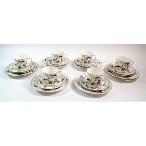 31 - A Salon China Burma tea service decorated exotic birds comprising six cups, eight saucers and eight ... 