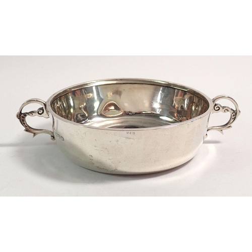 312 - A silver two handled shallow bowl, 11cm diameter, Chester 1912, 157g