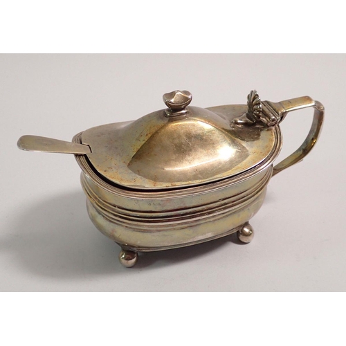 313 - A Georgian silver mustard pot with blue glass liner, London 1815 and matched Georgian silver spoon, ... 