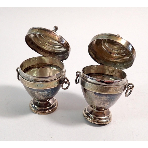 314 - A pair of continental silver miniature urn form boxes, import marks for 1891, by 	Soloman Nathan Nyb... 