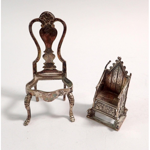 315 - A continental silver Queen Anne style miniature model chair, 8cm 32.8g and a silver ecclesiastical c... 