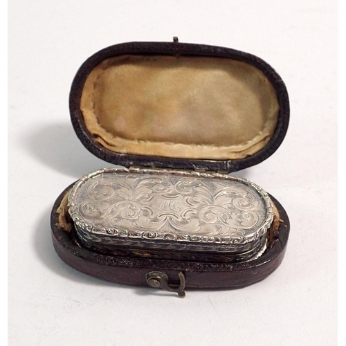 328 - A Victorian silver vinaigrette with engraved foliate decoration and silver gilt flower and foliate p... 