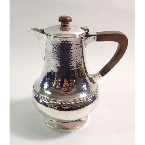 340 - An Arts & Crafts silver hammered coffee jug by A E Jones, 19cm tall, Birmingham 1922, 400g