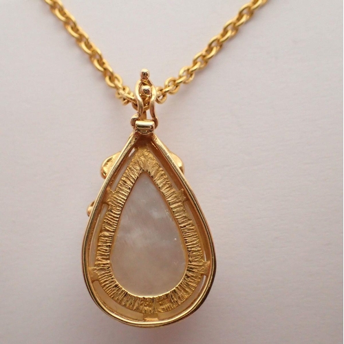 346 - An 18 carat gold and pearl pendant on gold plated chain, 2.6cm drop, pendant 4g