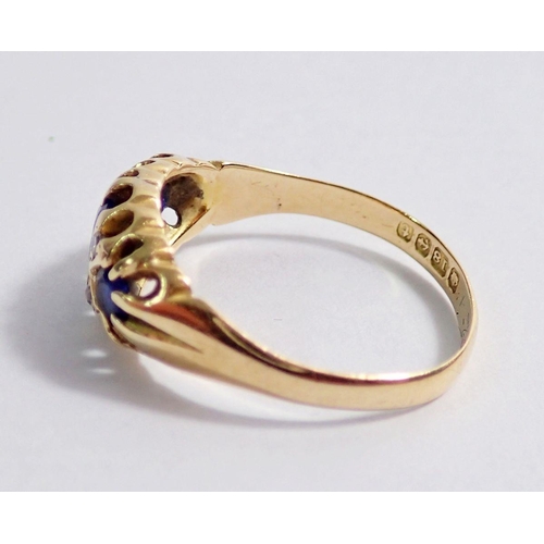 350 - An 18 carat gold ring set three sapphires and four chip diamonds, size Q, 3g