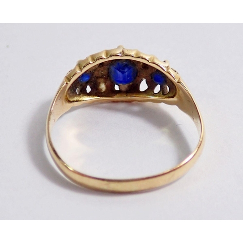 350 - An 18 carat gold ring set three sapphires and four chip diamonds, size Q, 3g