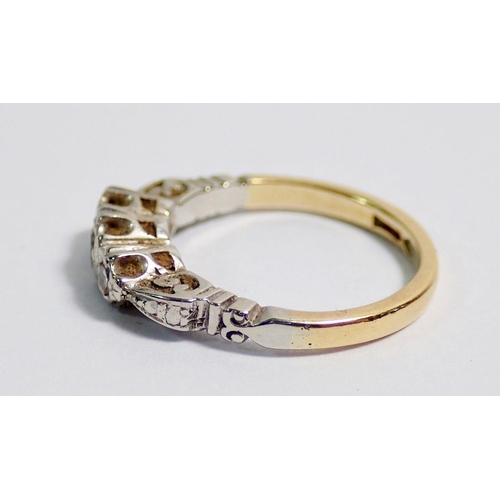 352 - An Edwardian gold ring illusion set three diamonds, size G, 2.5g