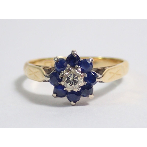 358 - An 18 carat gold sapphire and diamond cluster ring, size L, 2.5g