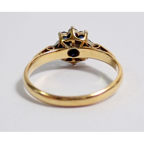 358 - An 18 carat gold sapphire and diamond cluster ring, size L, 2.5g