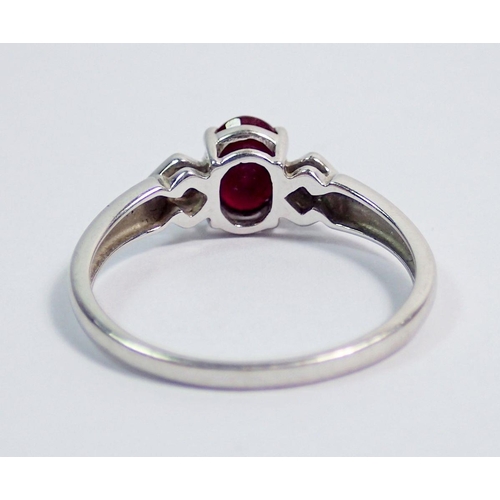 360 - A 9 carat white gold ring set ruby flanked by two diamonds, size O to P, 2.1g