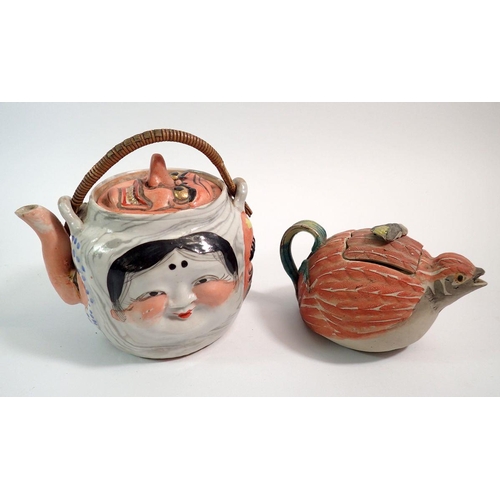 38 - A Japanese Bankoware five faces teapot, repair to spout and a Bankoware quail teapot, crack to lid