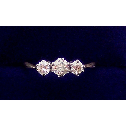 385 - An 18 carat gold three stone diamond ring, size N, 1.5g