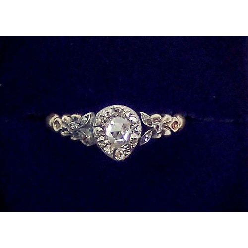 387 - An antique old cut diamond ring set in yellow and white metal, unmarked, repaired in places to shank... 