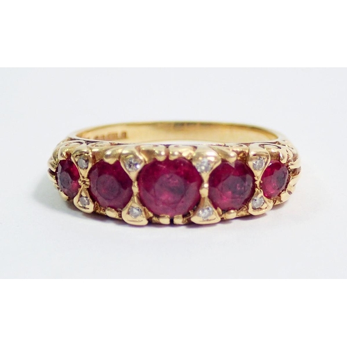 390 - An 18 carat gold ring set five graduated rubies interspersed with eight chip diamonds, size N, 5.1g