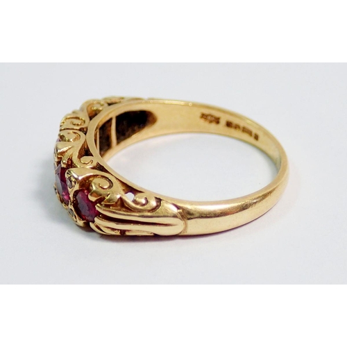 390 - An 18 carat gold ring set five graduated rubies interspersed with eight chip diamonds, size N, 5.1g