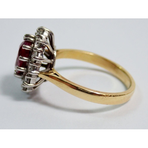 395 - An 18 carat gold ruby and diamond cluster ring, size P, 5.8g, cluster 11mm x 9mm