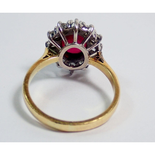 395 - An 18 carat gold ruby and diamond cluster ring, size P, 5.8g, cluster 11mm x 9mm