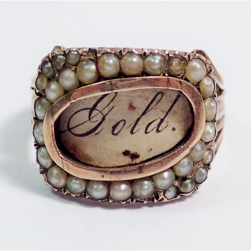 397 - An early 19th century gold mourning ring, the empty hair panel with pearl surround, size M to N, 3.6... 