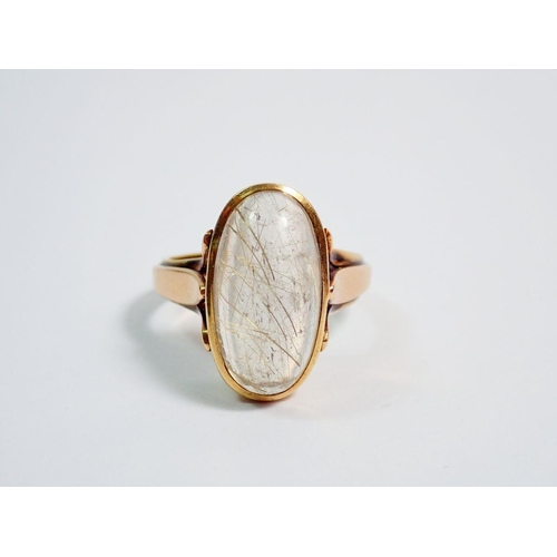 398 - An 18 carat gold gentleman's ring set oval cabochon cut rutilated quartz, size S, 9.6g