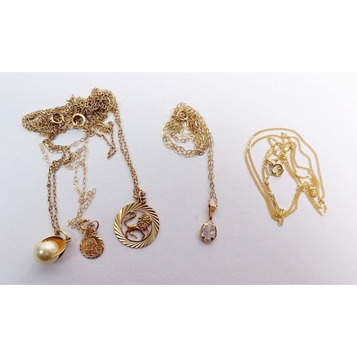 420 - A group of 9 carat gold fine chains and pendants plus a 14 carat gold fine chain, total weight 5.4g ... 