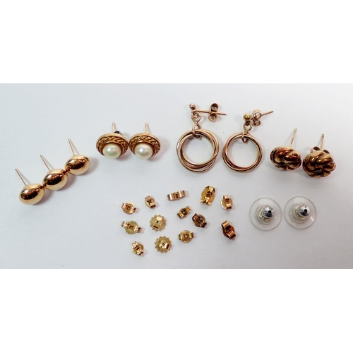 428 - Four pairs of 9 carat gold earrings, 10g plus a quantity of 9 carat gold butterflies, 1.3g